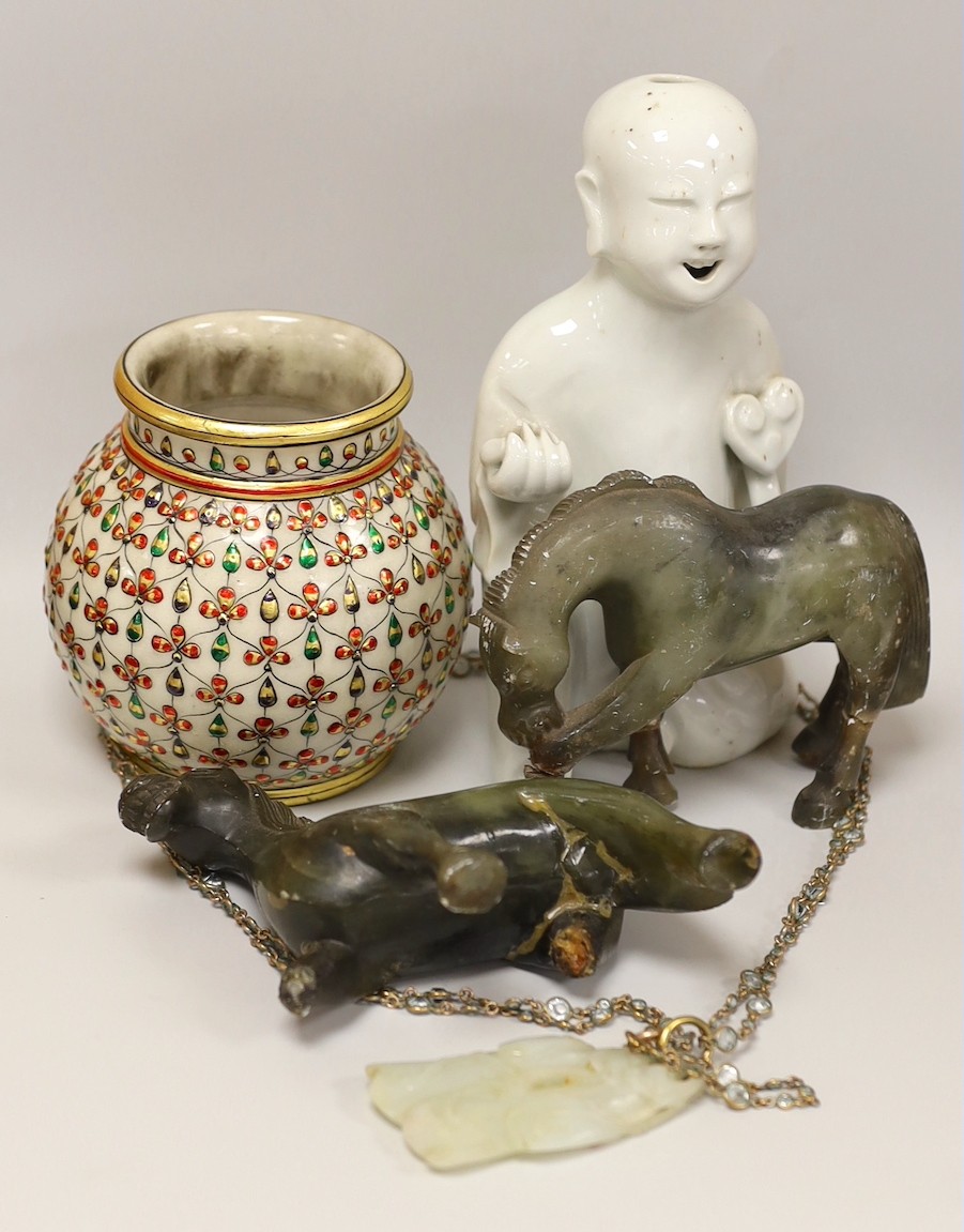 A 19th century Chinese pale celadon jade pendant a Chinese blanc de Chine figure, two soapstone horses and an Indian vase, figure 17cms high